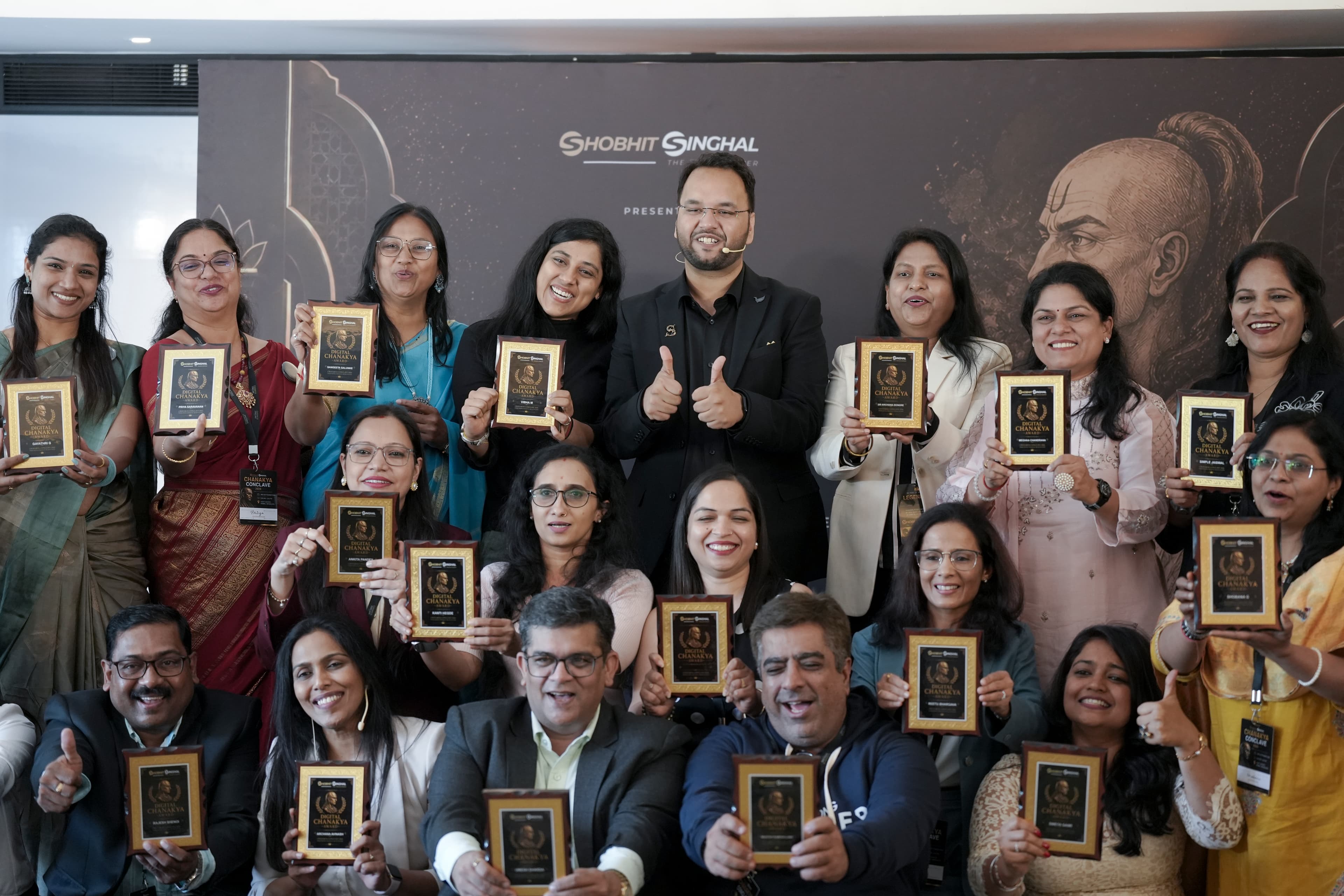 Transformers Hub members celebrating with their awards